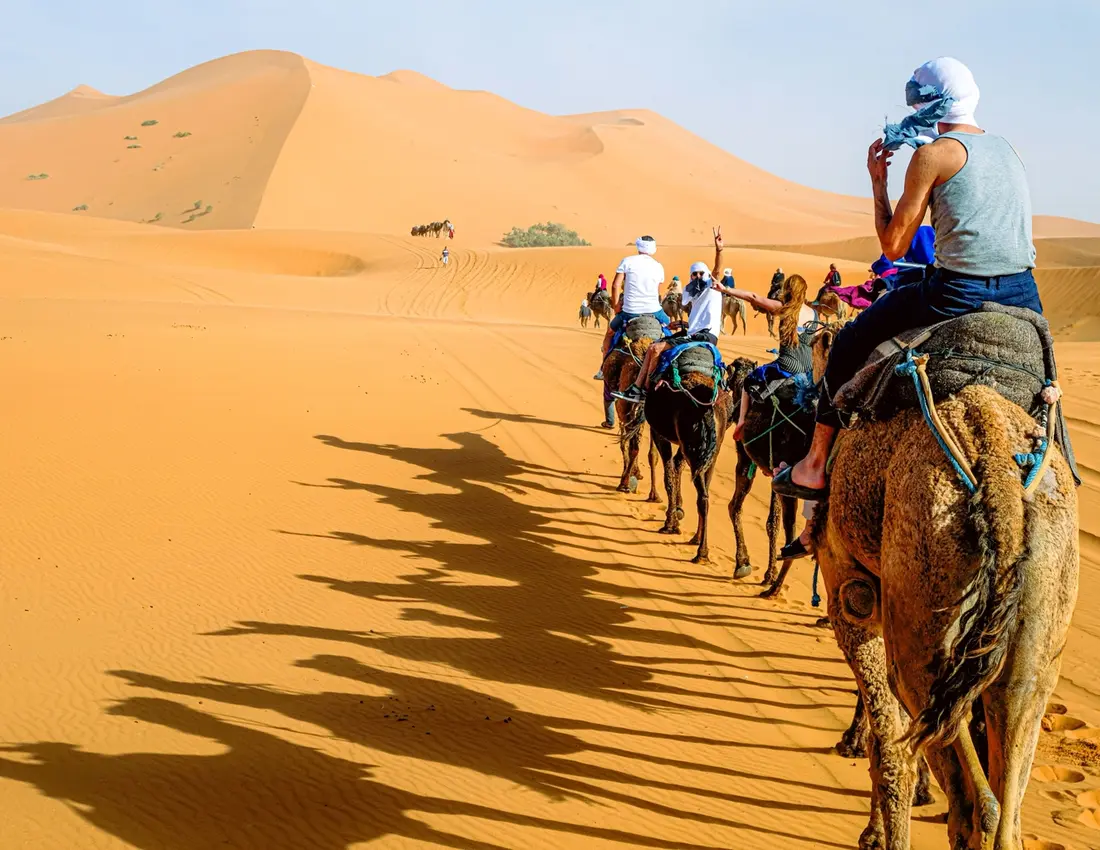 Paseo en dromedario al atardecer o amanecer en Merzouga